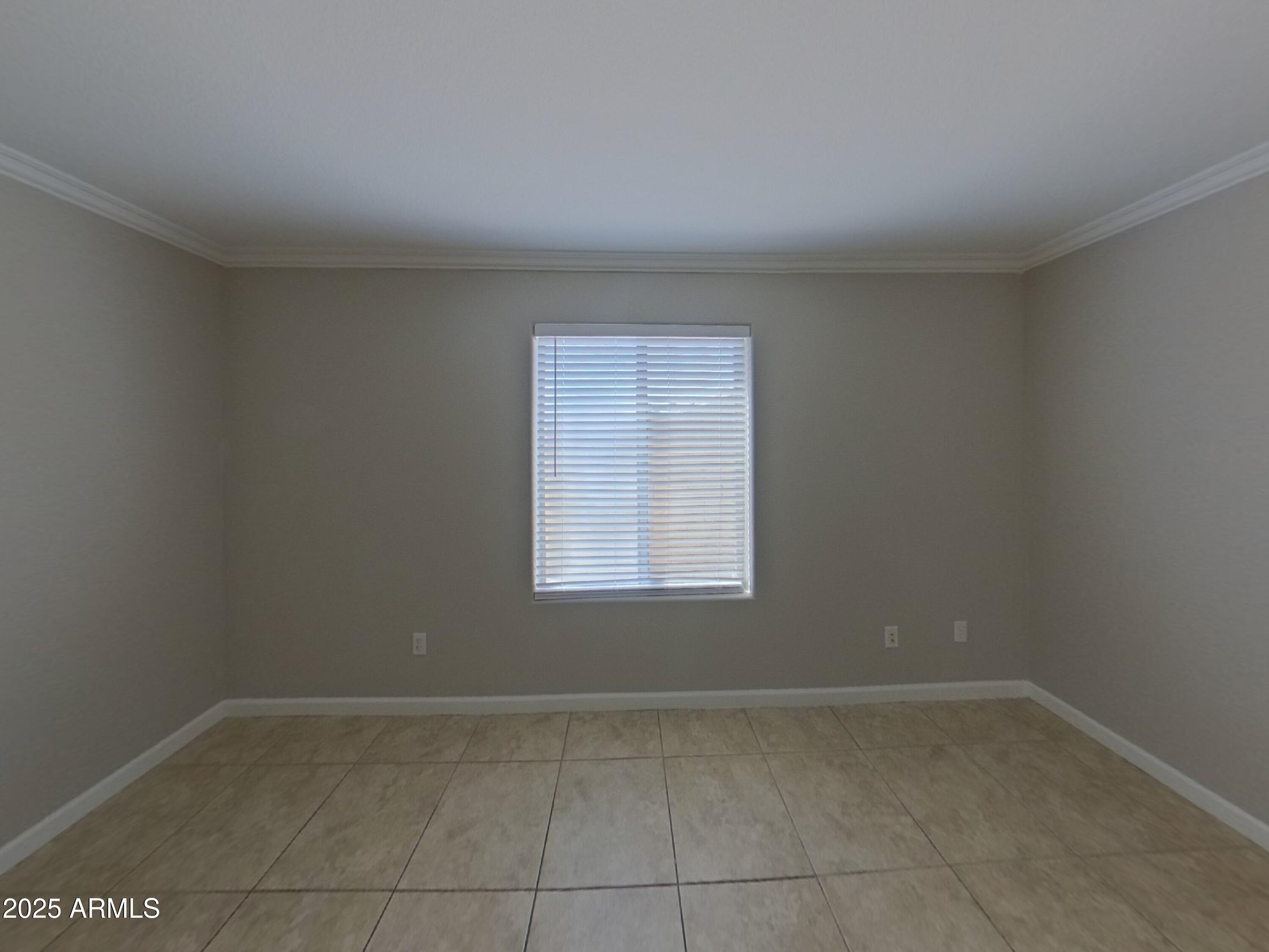 845 South Vineyard Mesa, AZ 85210 - Photo 15 of 26 a view of a livingroom with an empty space and a window
