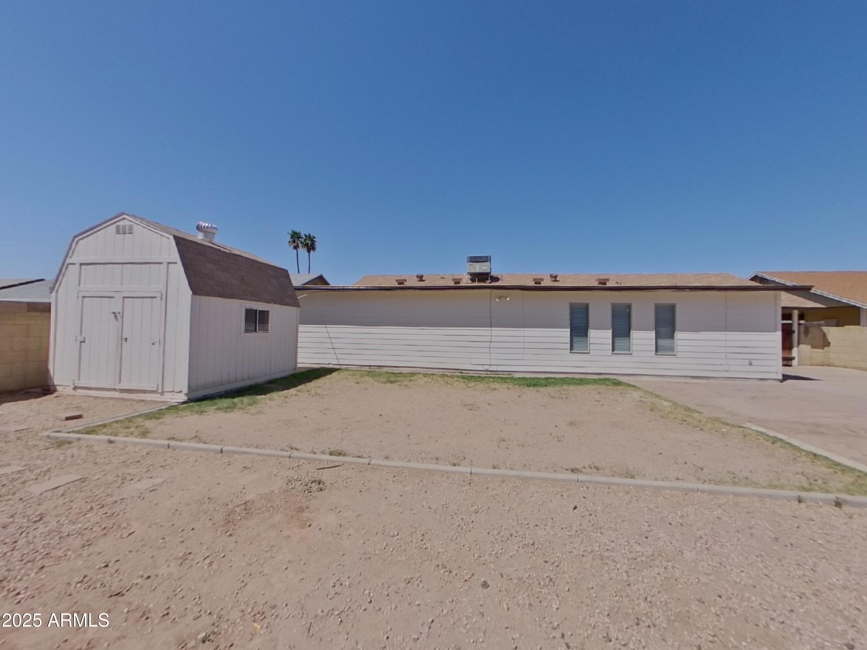 845 South Vineyard Mesa, AZ 85210 - Photo 22 of 26 a view of a parking space