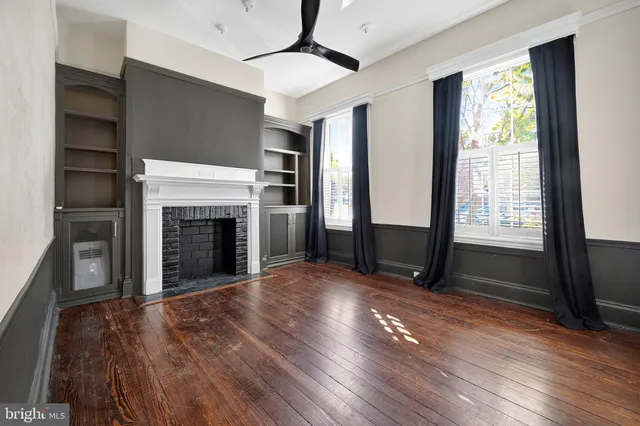 a kitchen with stainless steel appliances a refrigerator and a stove