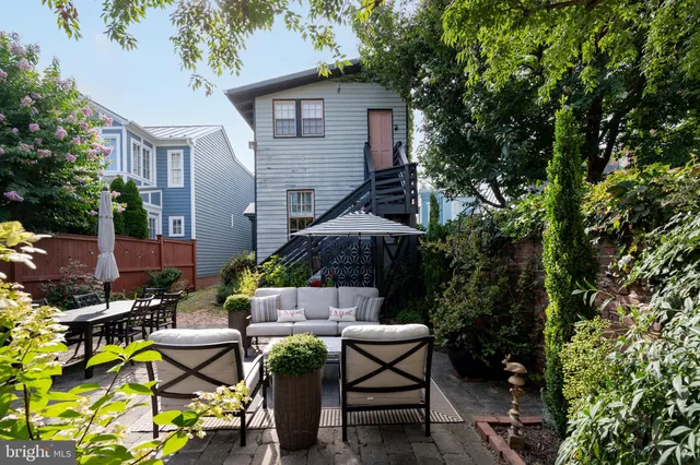 a garden view with a seating space