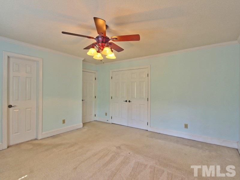 8004 Laurel Mountain Road Raleigh, NC 27613 - Photo 13 of 25 a view of an empty room