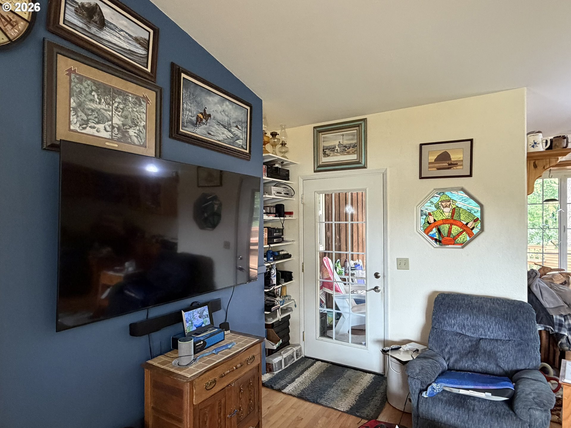 1372 Hampton Road Brookings, OR 97415 - Photo 5 of 42 a living room with furniture and a flat screen tv