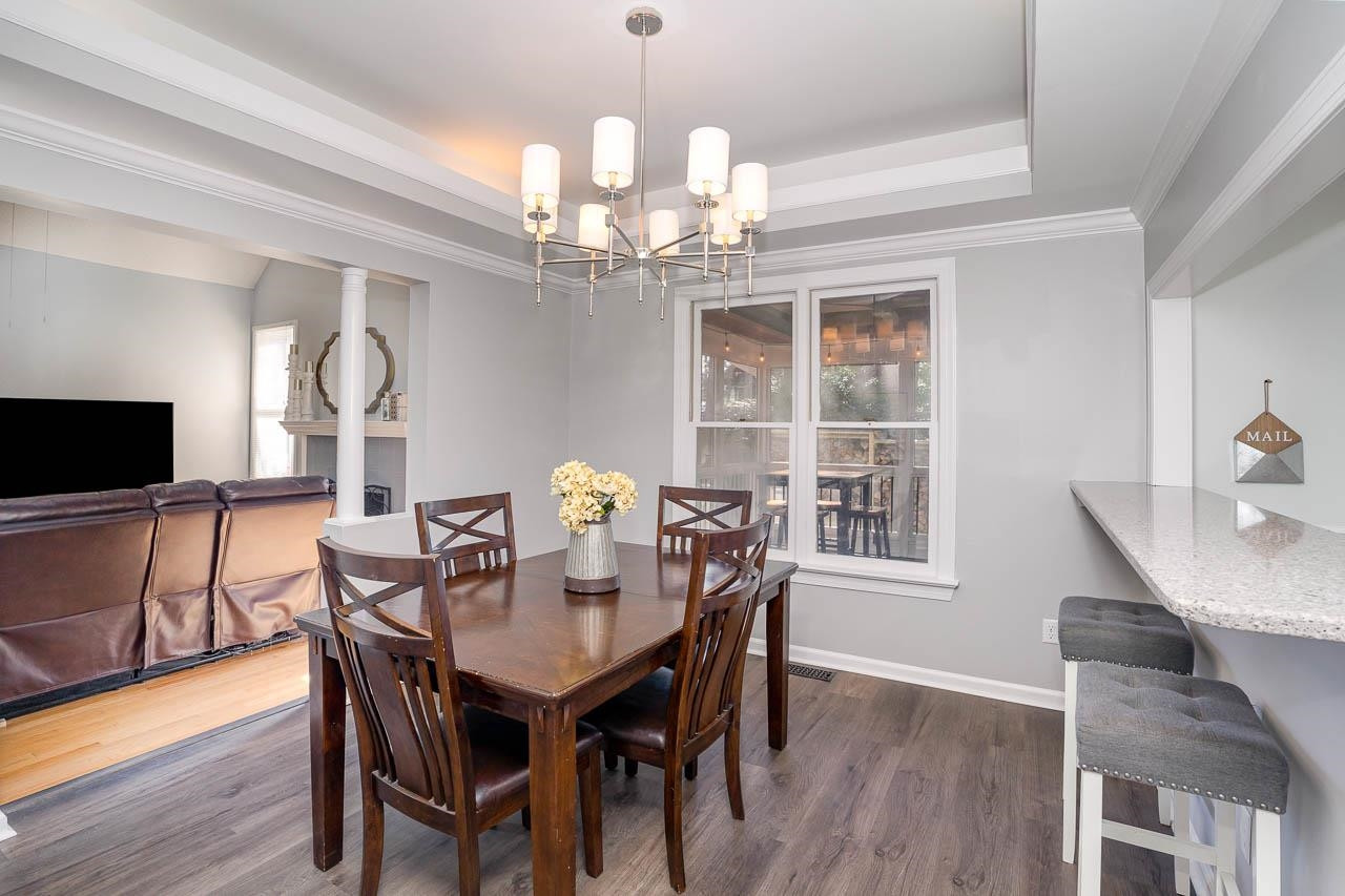 8904 Cub Trail Raleigh, NC 27615 - Photo 4 of 12 Open and airy Dining Space with access to both the Kitchen and Family Room, perfect for entertaining! Dining Room