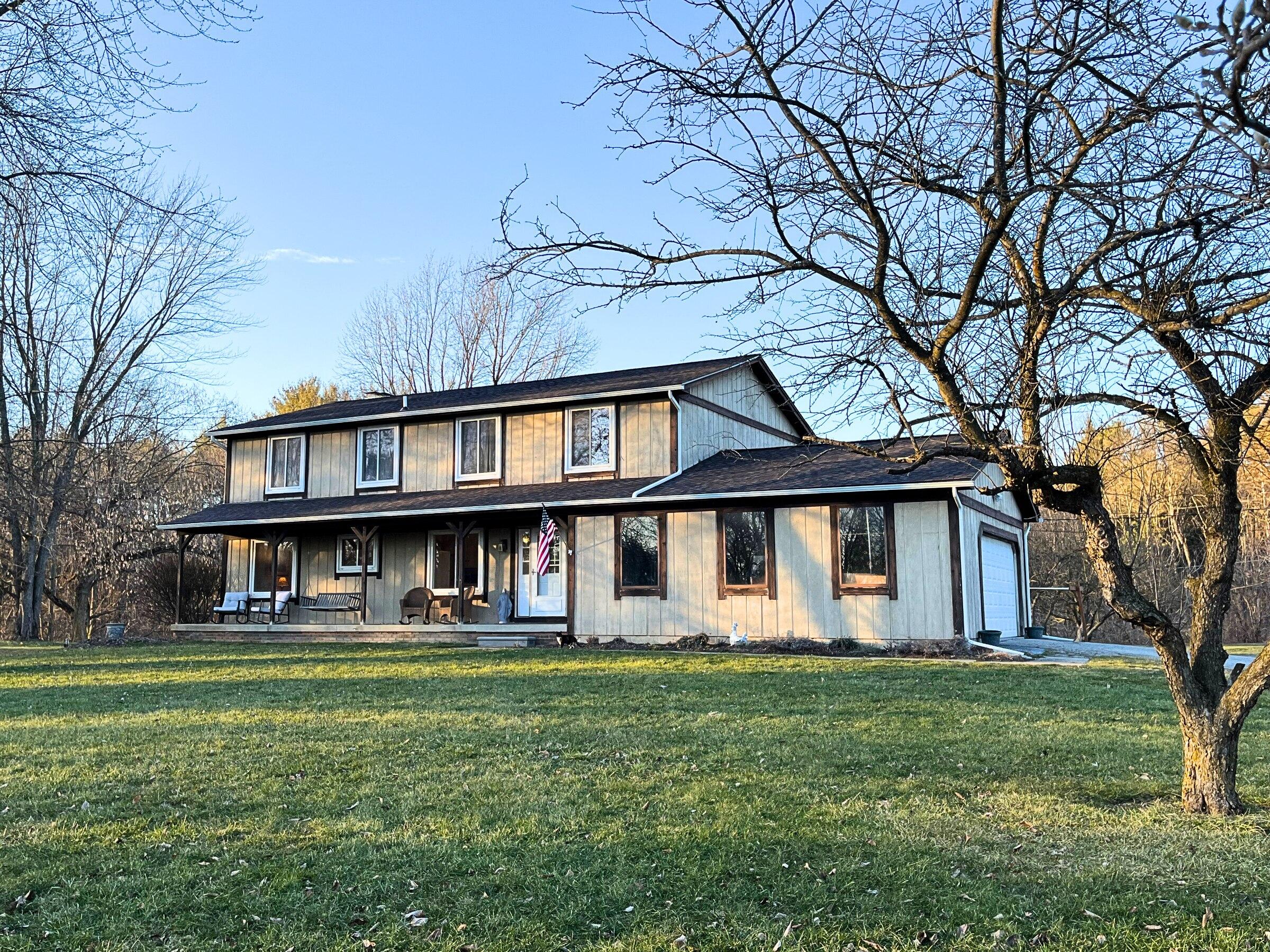 124 Triangle Lake Road Howell, MI 48843 - Photo 1 of 66 Triangle Lake Exterior 2 Blue Me