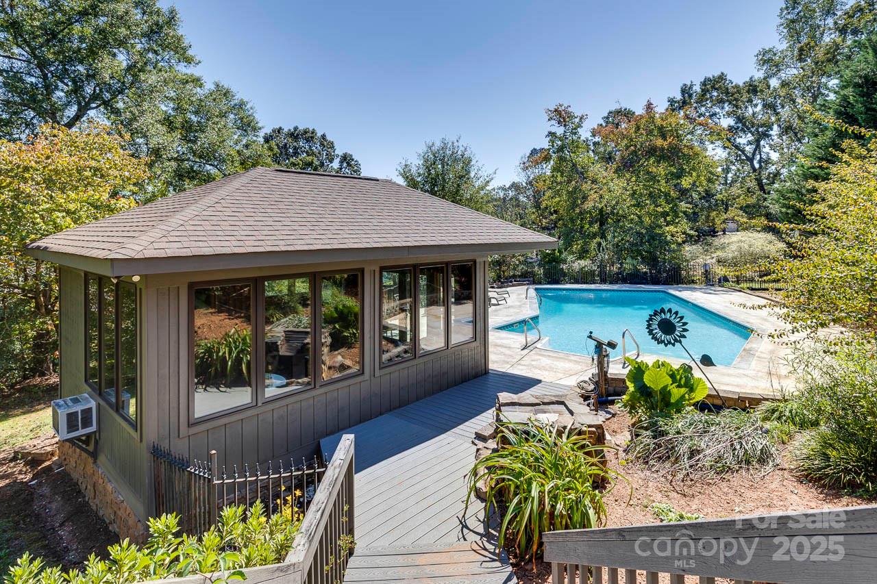 285 Old Batson Road Taylors, SC 29687 - Photo 2 of 48 a view of a patio with table and chairs and potted plants