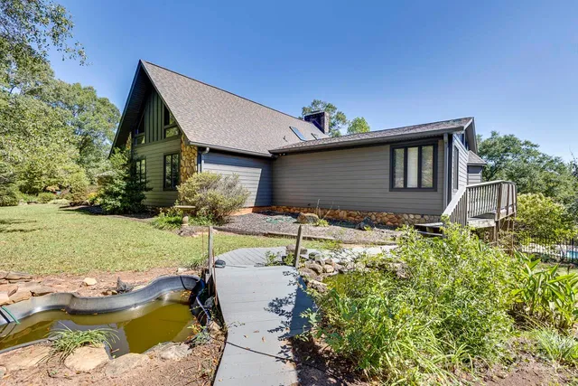a house view with a garden space