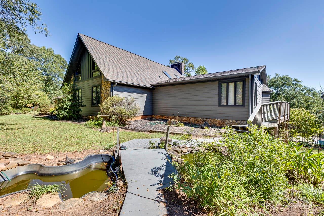 285 Old Batson Road Taylors, SC 29687 - Photo 23 of 48 a house view with a garden space