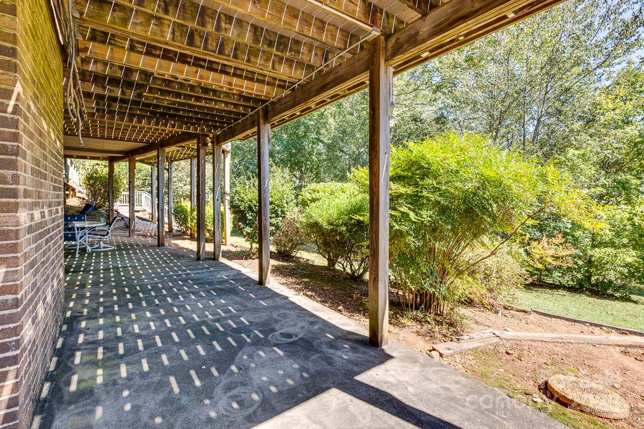 285 Old Batson Road Taylors, SC 29687 - Photo 31 of 48 a view of a porch with a patio