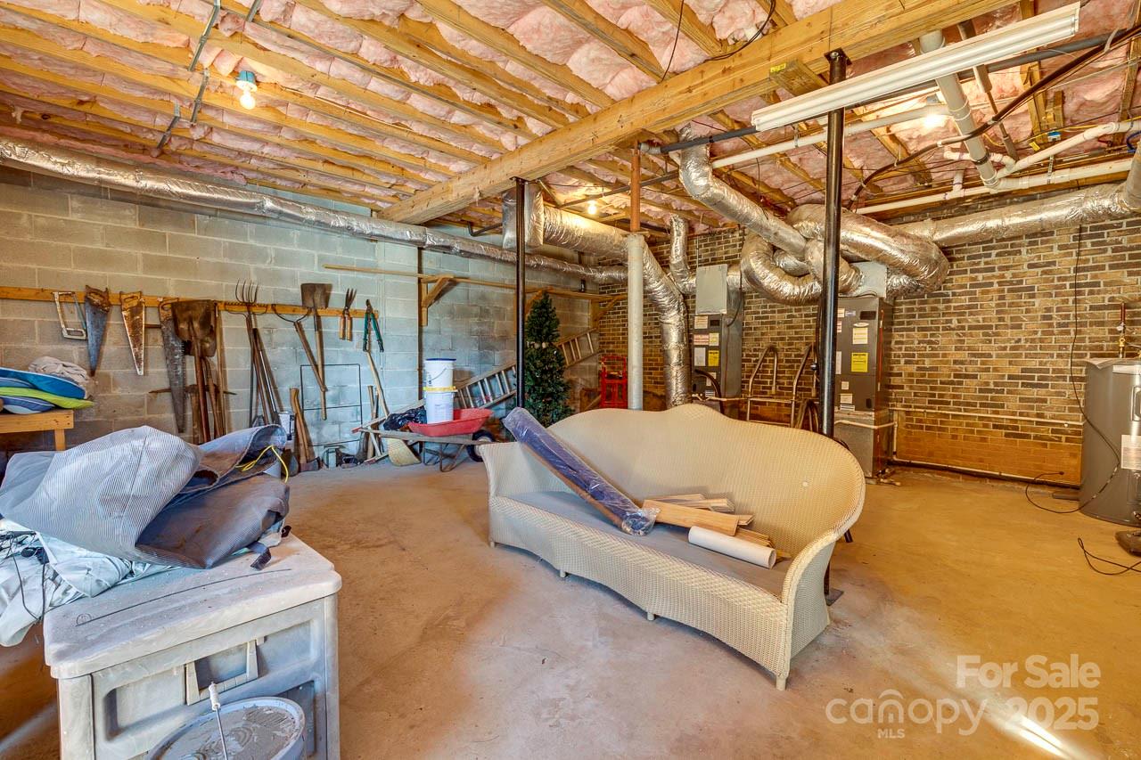 285 Old Batson Road Taylors, SC 29687 - Photo 40 of 48 a bed room with a bed and a walk in closet