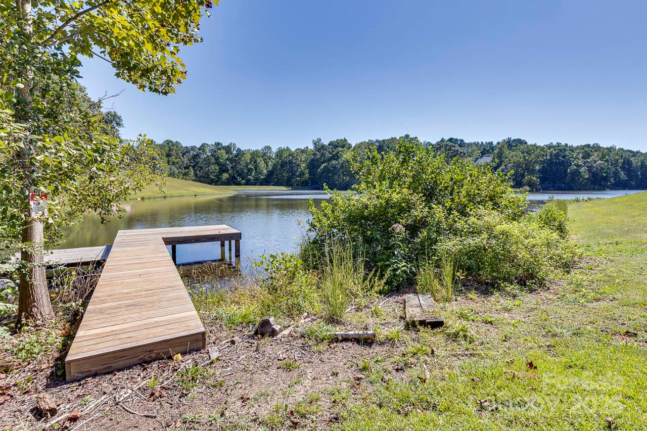 285 Old Batson Road Taylors, SC 29687 - Photo 4 of 48 a wooden pier with boats in the background
