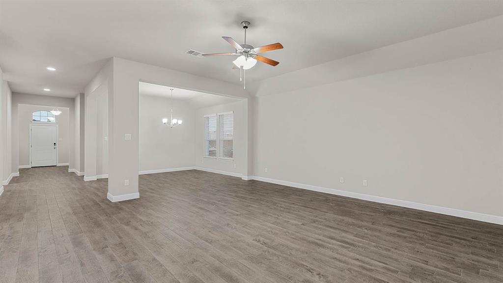 3275 Grayton Street Grand Prairie, TX 76065 - Photo 11 of 36 a view of an empty room with wooden floor