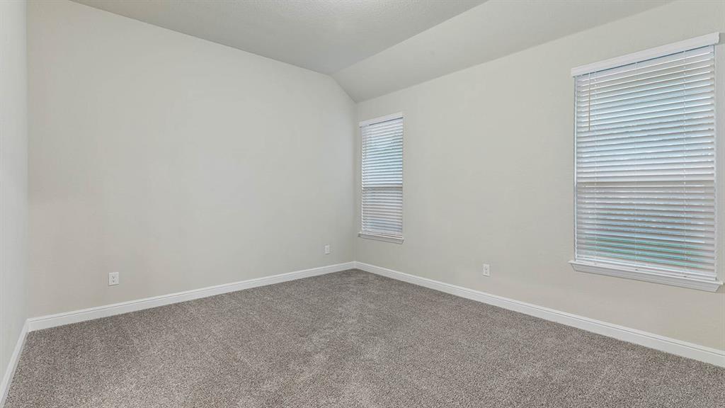 3275 Grayton Street Grand Prairie, TX 76065 - Photo 24 of 36 an empty room with a window