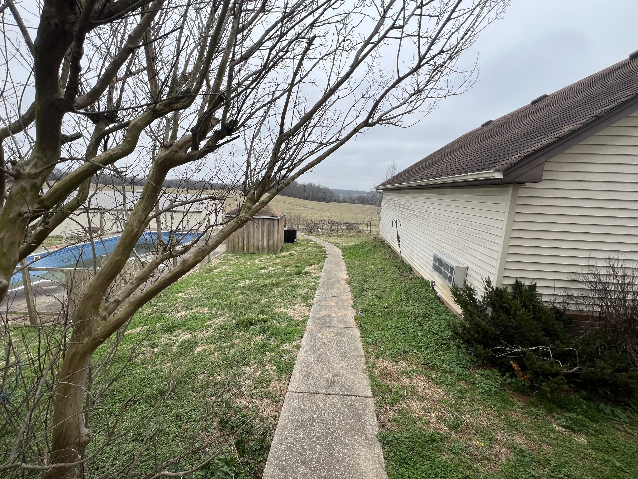 141 Buntin Mill Road Portland, TN 37148 - Photo 14 of 45 a pathway of a house with a yard