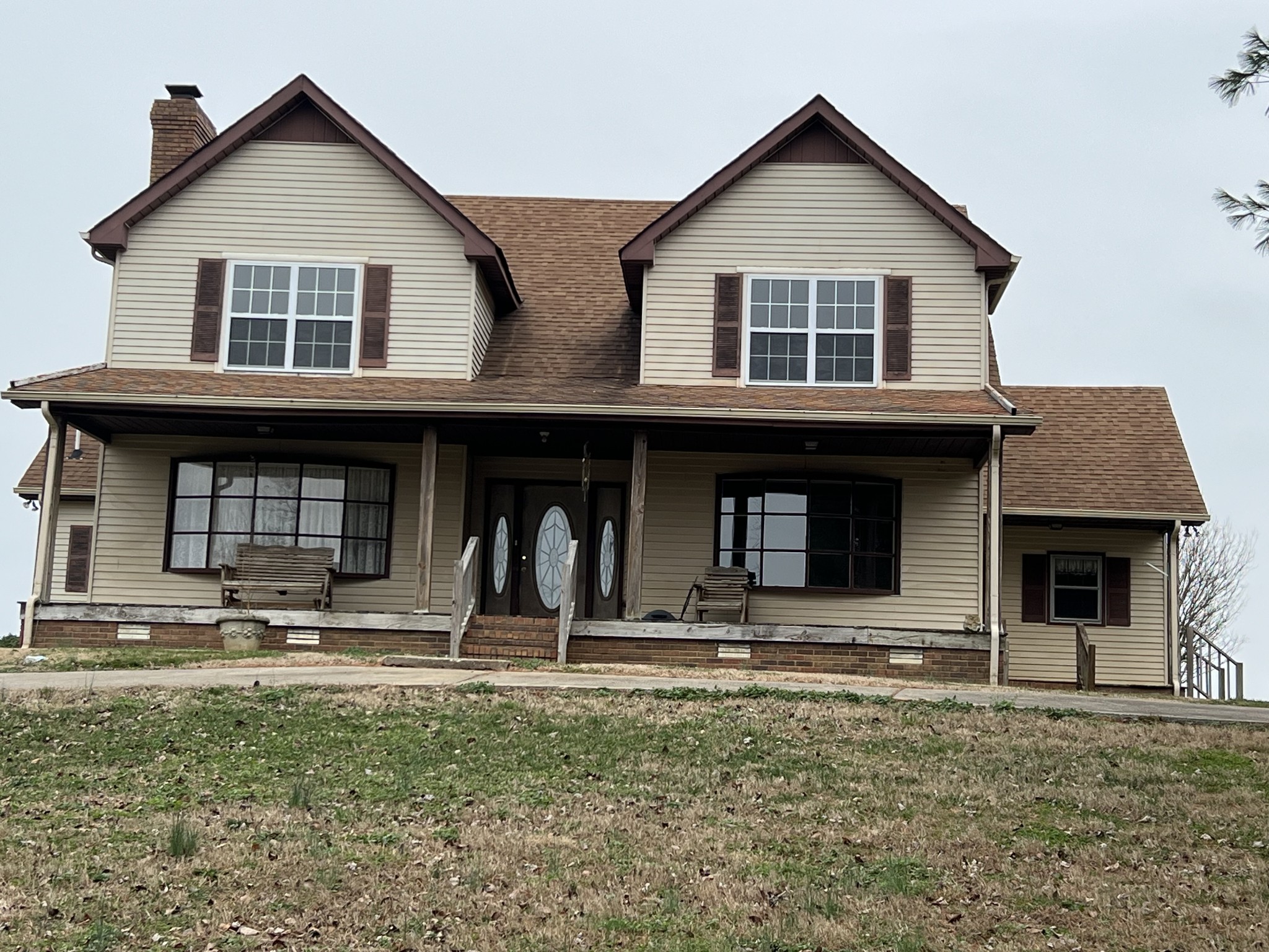 141 Buntin Mill Road Portland, TN 37148 - Photo 2 of 45 a front view of a house with a yard