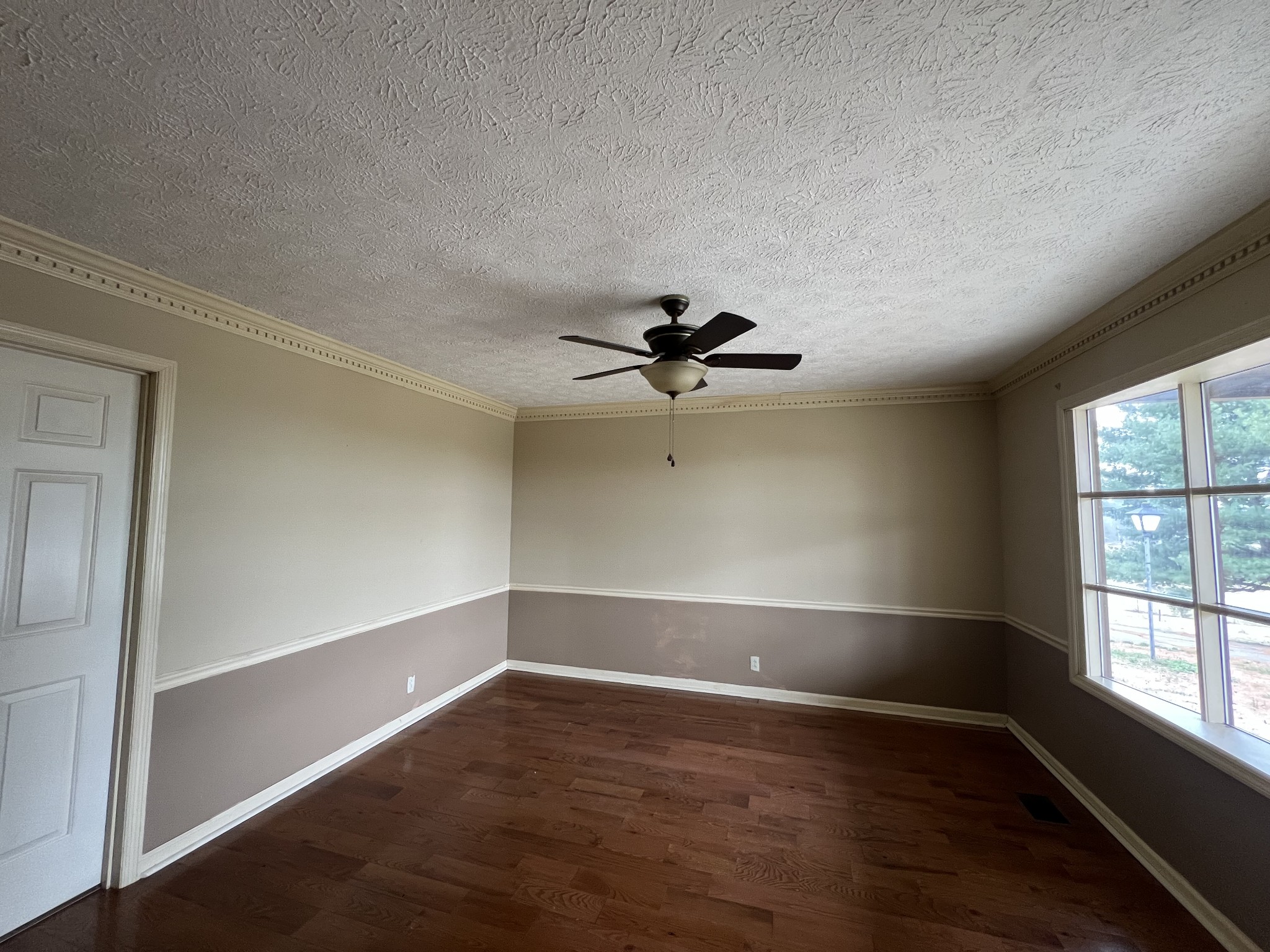 141 Buntin Mill Road Portland, TN 37148 - Photo 21 of 45 wooden floor in an empty room with a window