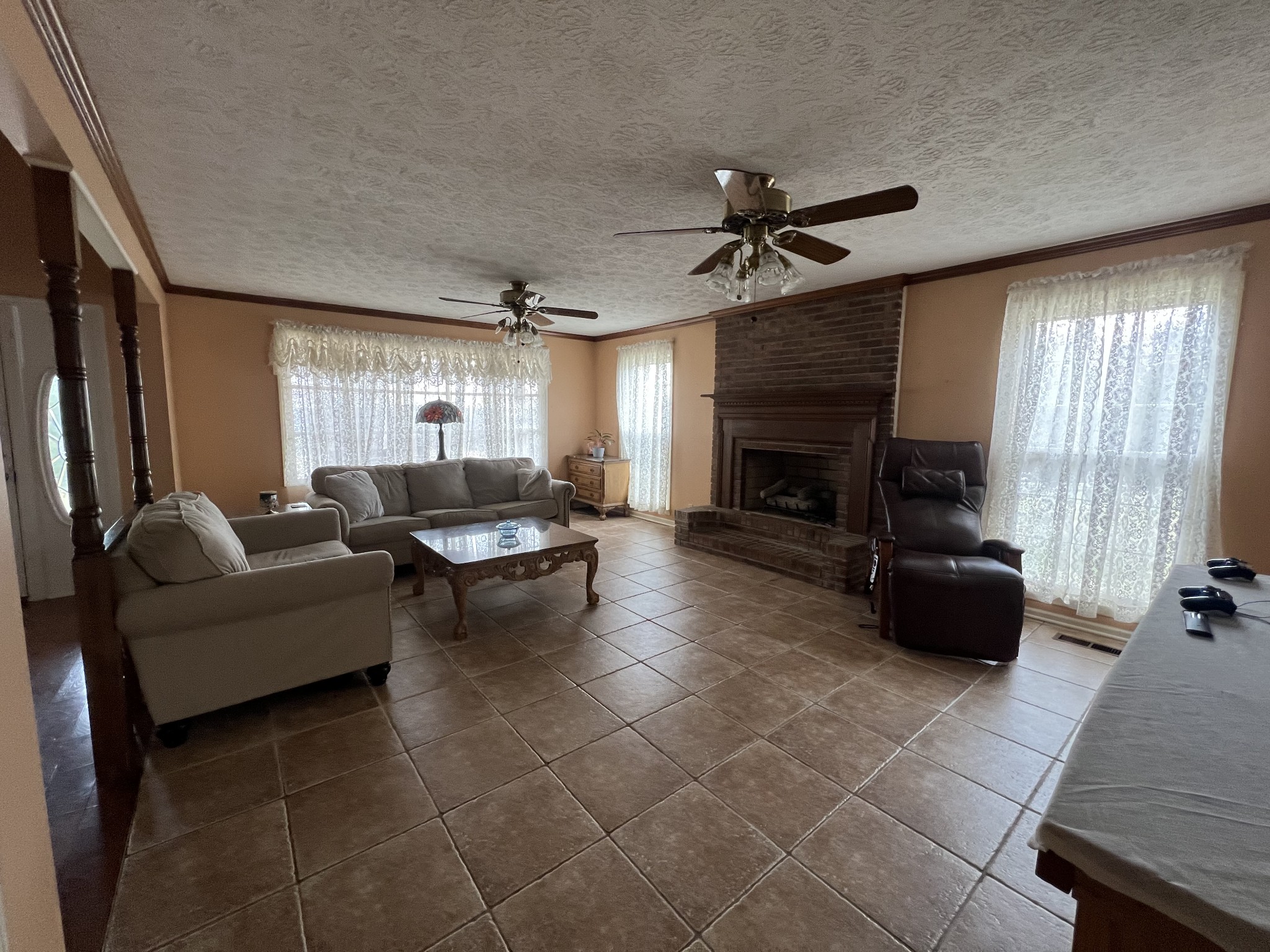 141 Buntin Mill Road Portland, TN 37148 - Photo 23 of 45 a living room with furniture and a fireplace