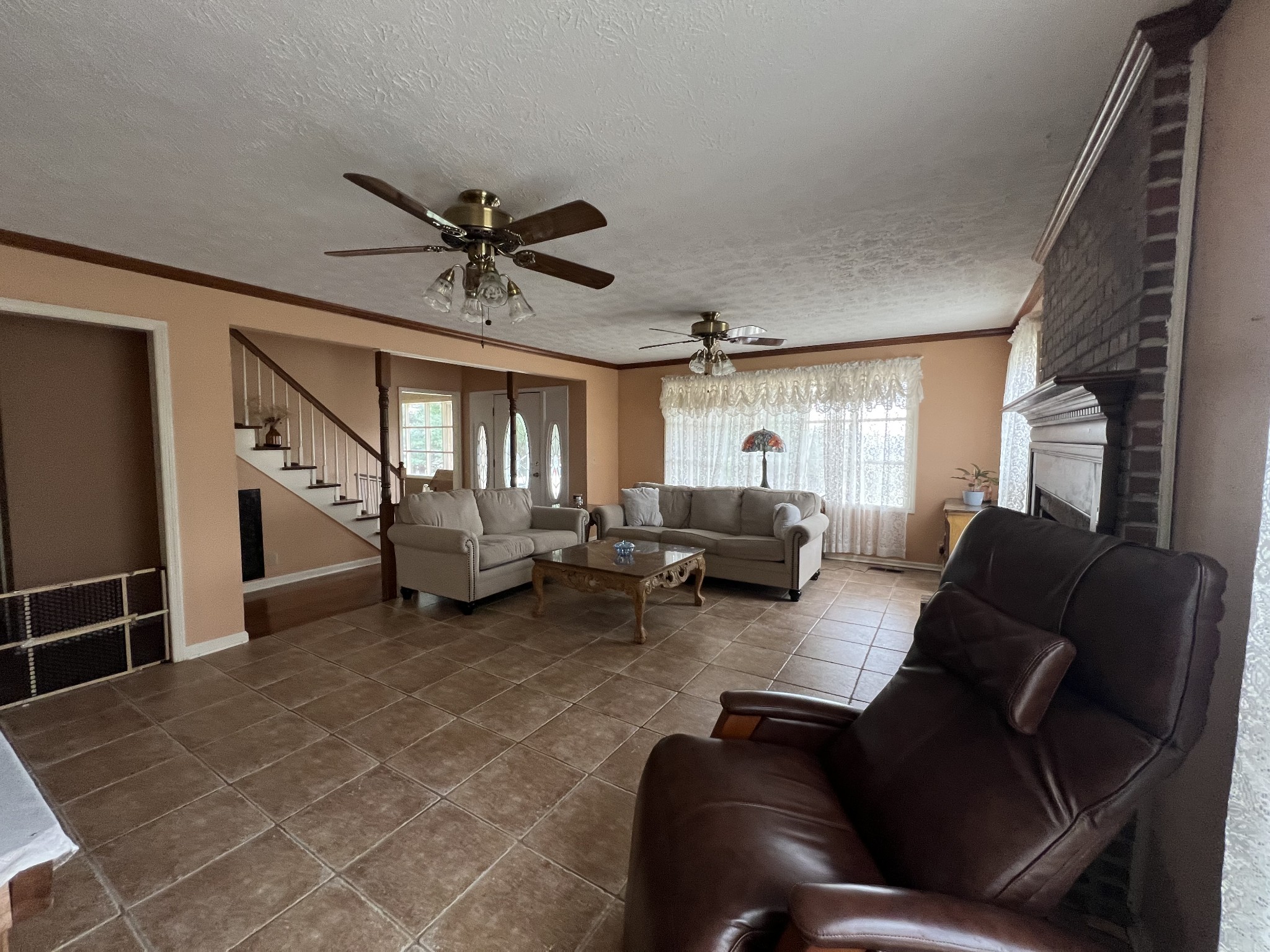 141 Buntin Mill Road Portland, TN 37148 - Photo 24 of 45 a living room with furniture and a large window