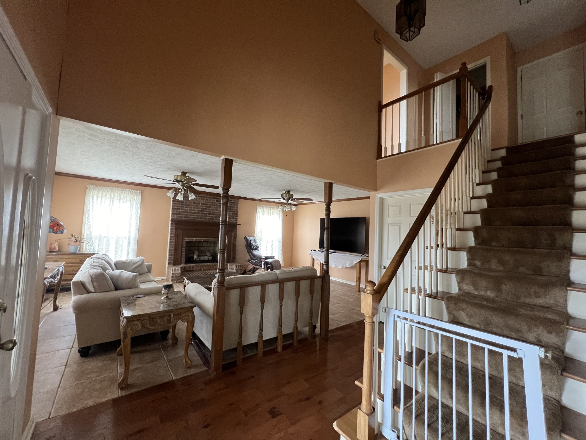 141 Buntin Mill Road Portland, TN 37148 - Photo 27 of 45 a living room with furniture and wooden floor