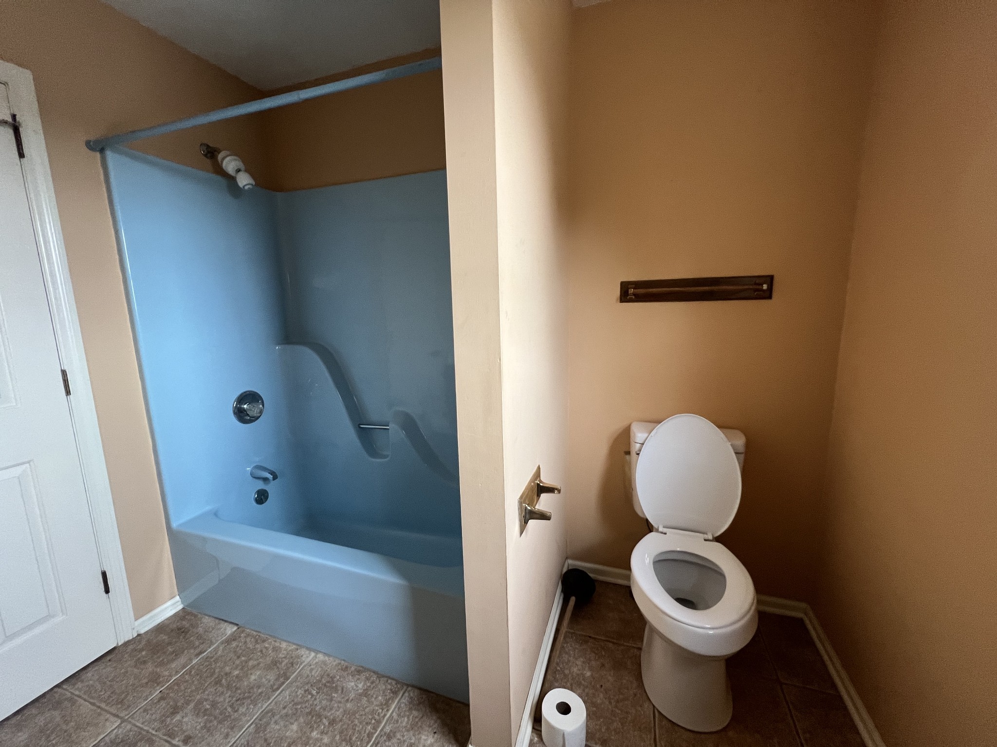 141 Buntin Mill Road Portland, TN 37148 - Photo 36 of 45 a bathroom with a toilet and a shower