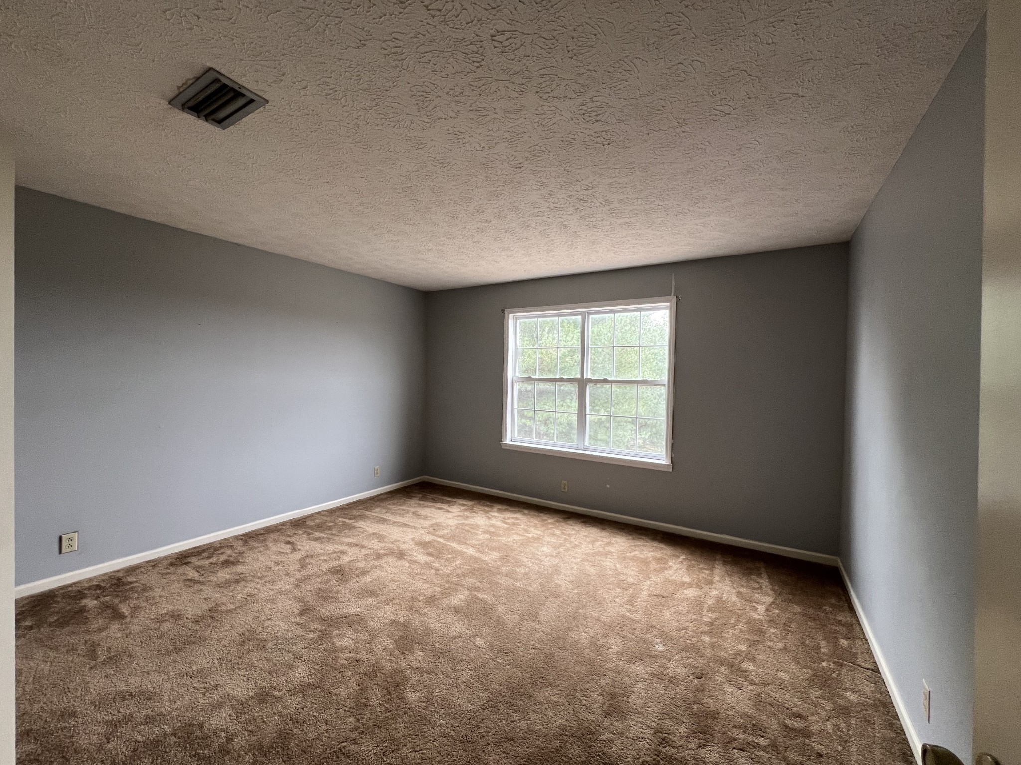 141 Buntin Mill Road Portland, TN 37148 - Photo 37 of 45 an empty room with a window