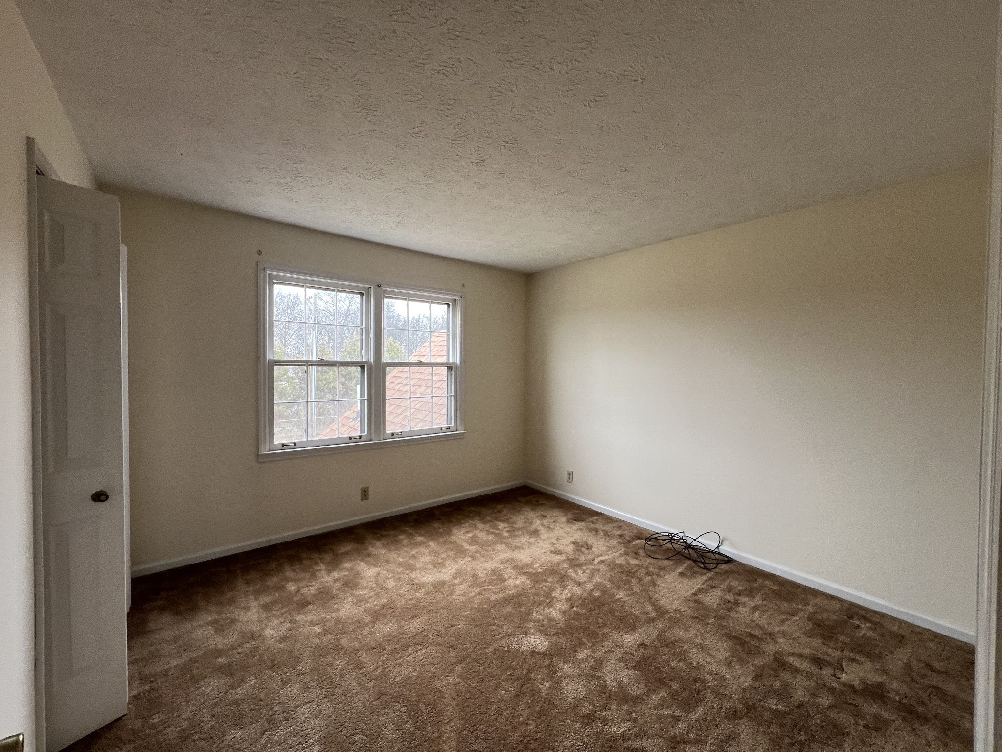 141 Buntin Mill Road Portland, TN 37148 - Photo 39 of 45 an empty room with a window