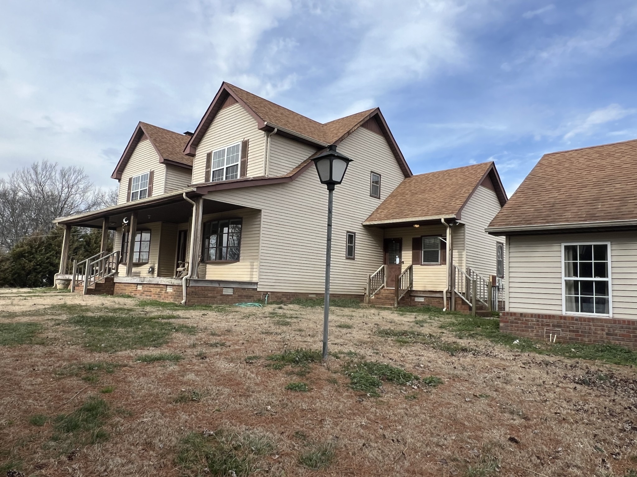 141 Buntin Mill Road Portland, TN 37148 - Photo 4 of 45 a front view of a house with a yard