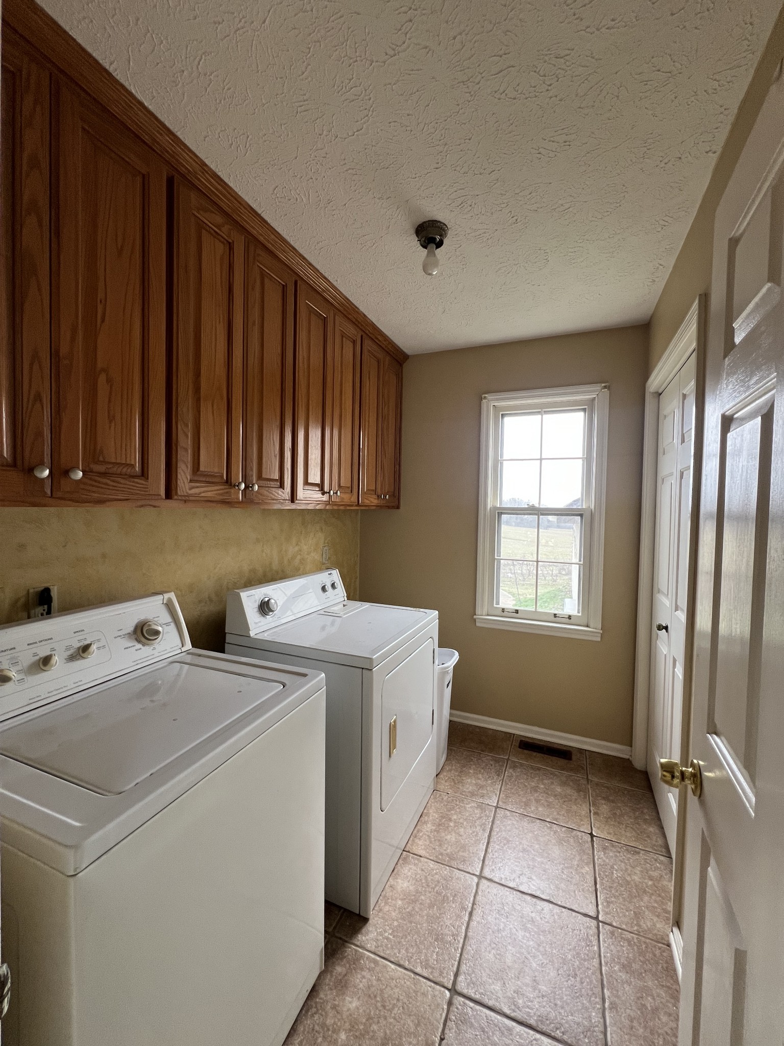 141 Buntin Mill Road Portland, TN 37148 - Photo 43 of 45 a utility room with dryer and washer