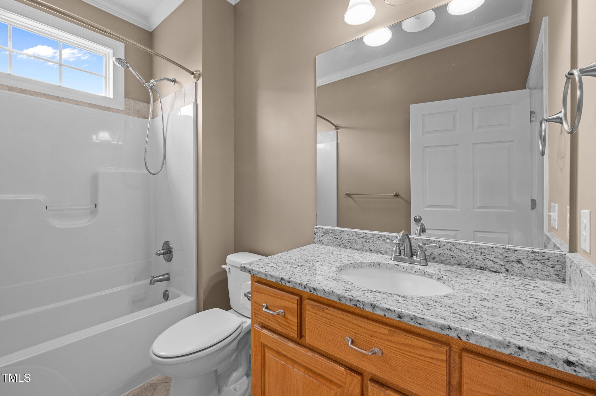 5556 Hurdle Mills Road Roxboro, NC 27574 - Photo 33 of 53 a bathroom with a granite countertop sink toilet and shower