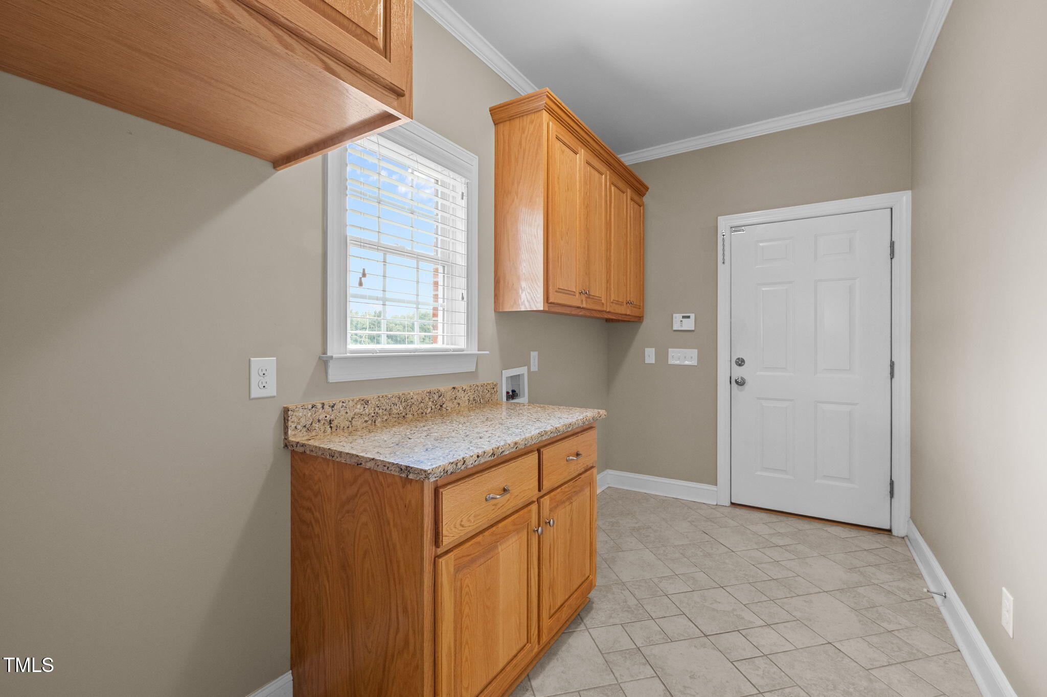 5556 Hurdle Mills Road Roxboro, NC 27574 - Photo 34 of 53 a utility room with a sink dryer and washer