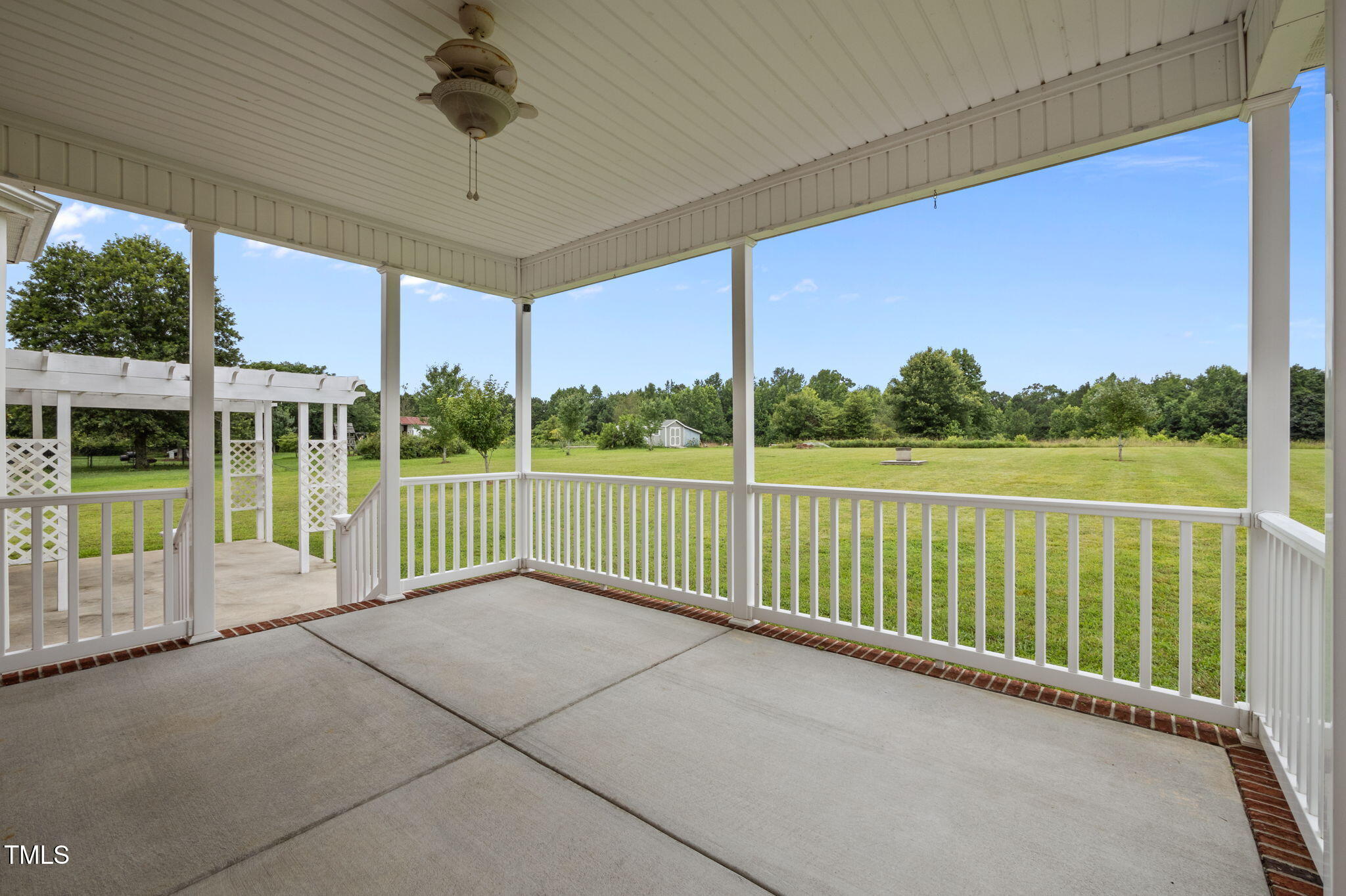 5556 Hurdle Mills Road Roxboro, NC 27574 - Photo 36 of 53 a view of a room with a floor to ceiling windows