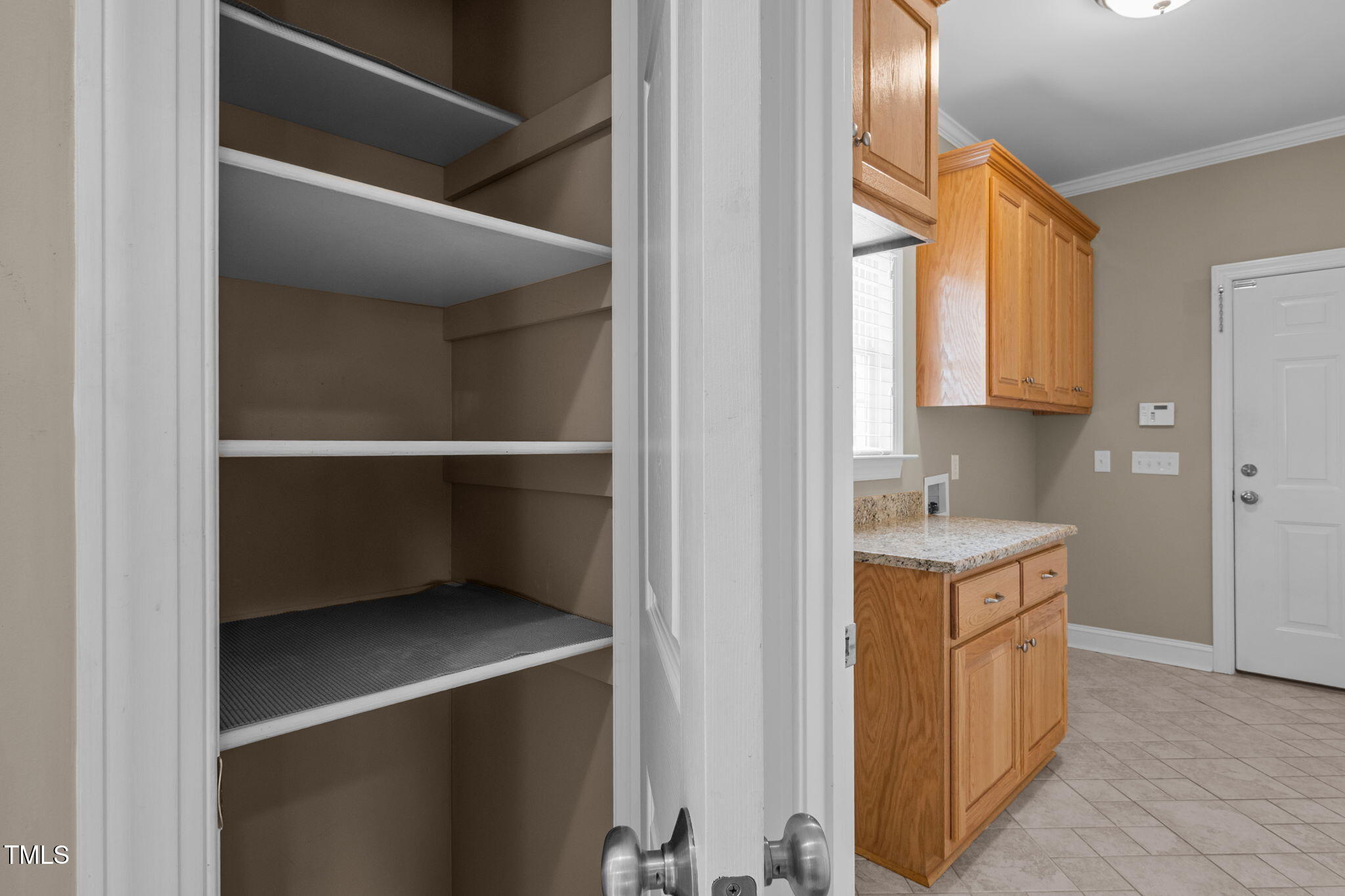 5556 Hurdle Mills Road Roxboro, NC 27574 - Photo 39 of 53 a utility room with a sink a washer and dryer