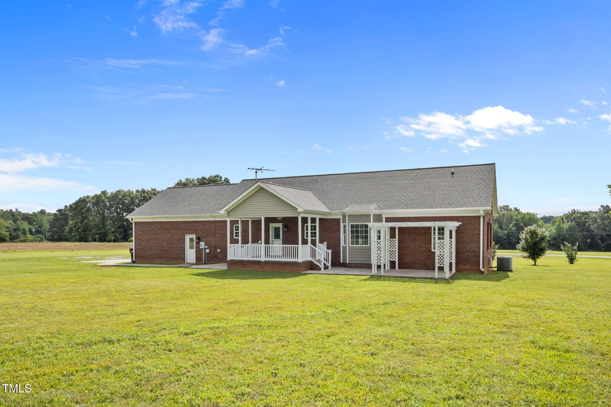 5556 Hurdle Mills Road Roxboro, NC 27574 - Photo 48 of 53 a view of a house with a big yard