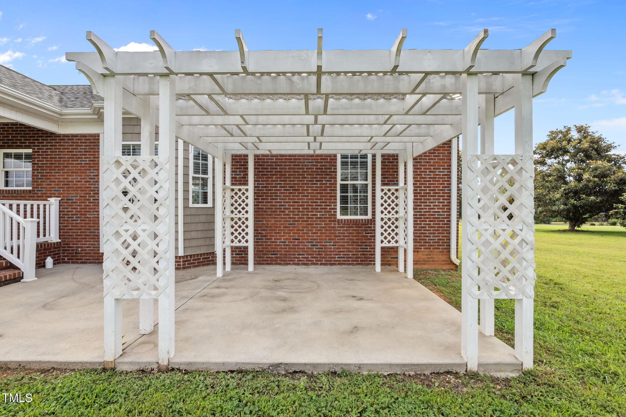 5556 Hurdle Mills Road Roxboro, NC 27574 - Photo 51 of 53 a front view of a house with a porch