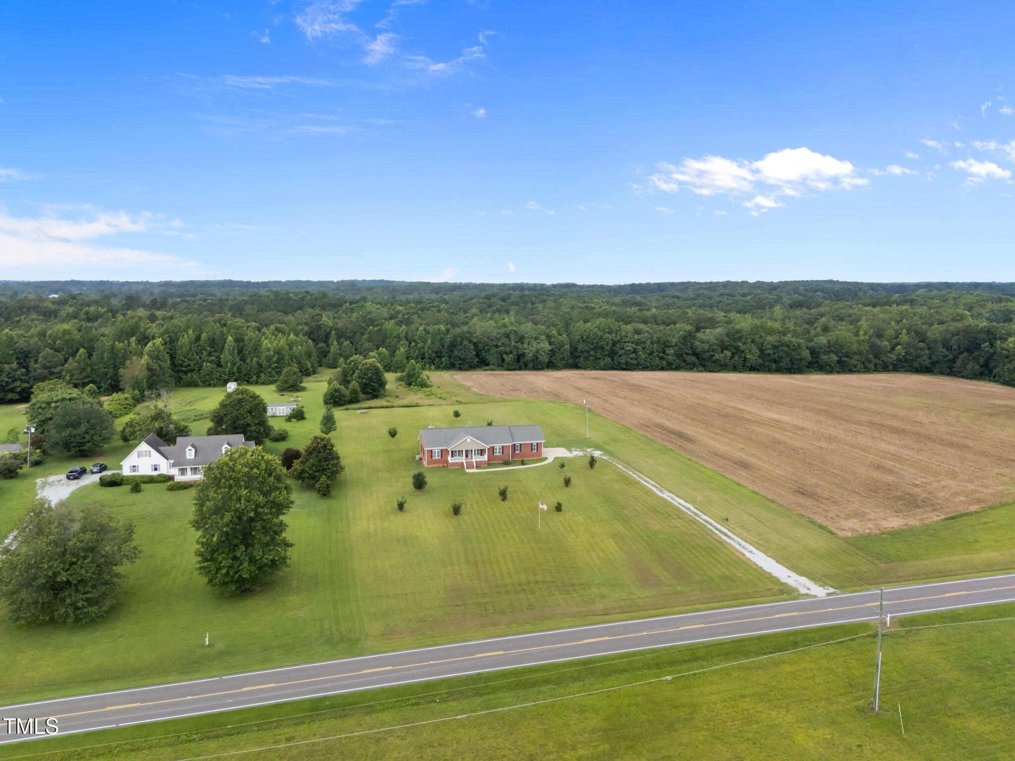 5556 Hurdle Mills Road Roxboro, NC 27574 - Photo 6 of 53 a view of a tennis court