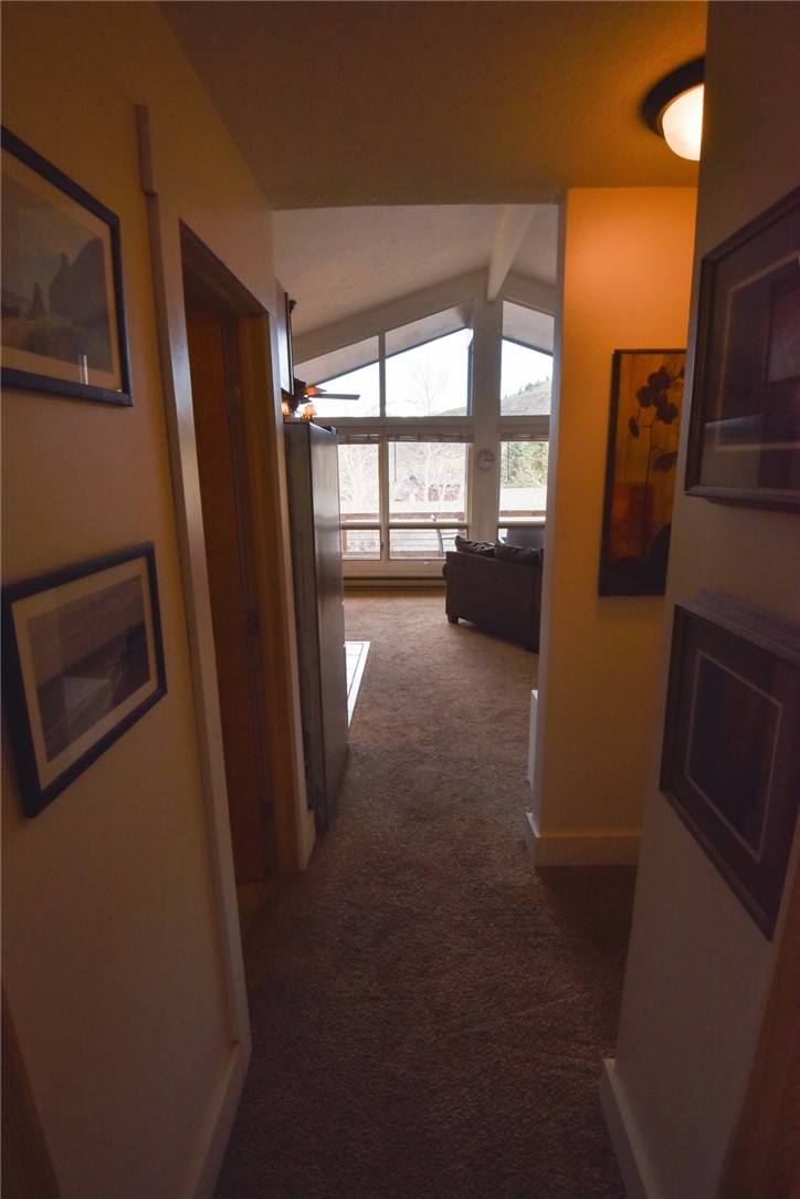 423 Big Elk Road Dillon, CO 80435 - Photo 14 of 35 Looking from 2nd bedroom, master is on the right and bathroom is on the left; great room straight ahead.