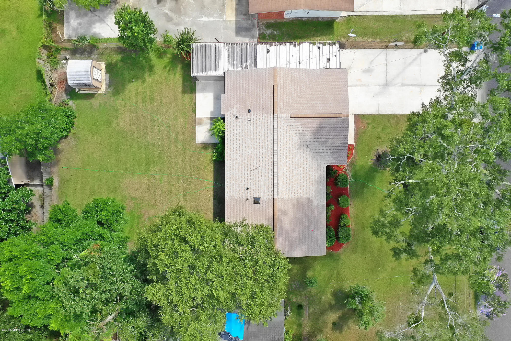 10475 Tulsa Road Jacksonville, FL 32218 - Photo 30 of 30 an aerial view of residential house with outdoor space and trees all around