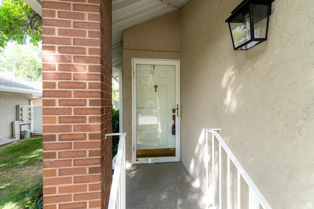 888 East 6895 South Midvale, UT 84047 - Photo 28 of 54 Property entrance featuring stucco siding