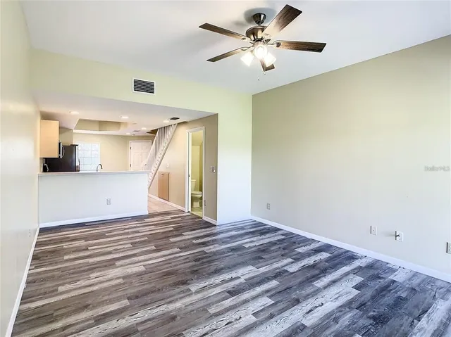 a view of a livingroom with a ceiling fan