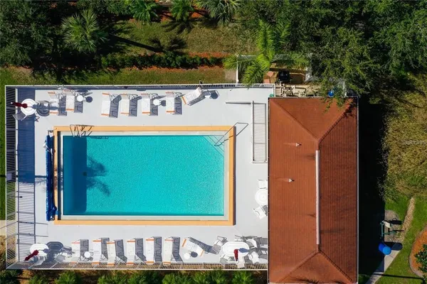 a aerial view of a house with a yard