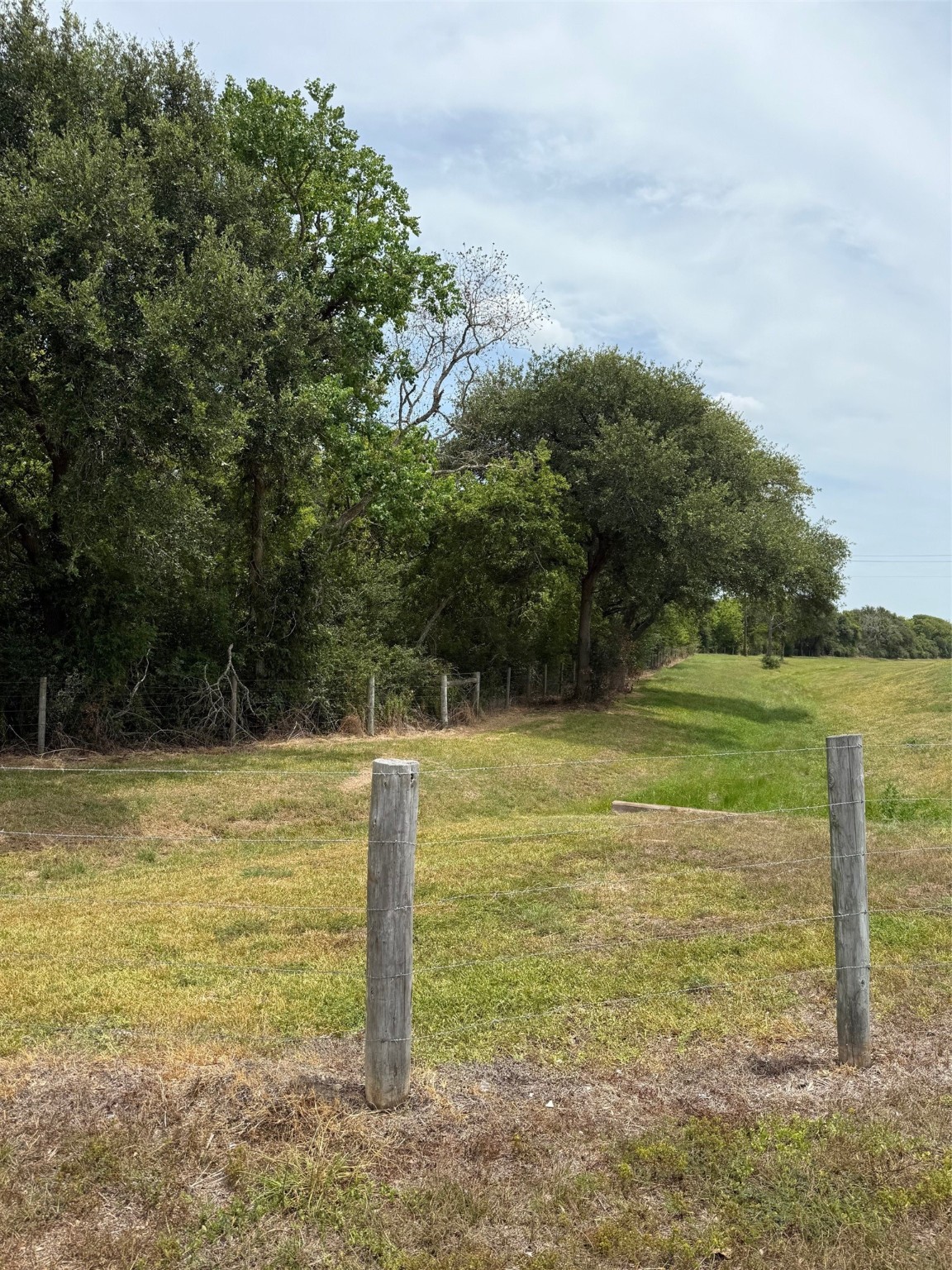 0 Lake Road La Marque, TX 77568 - Photo 4 of 12 a view of a golf course with a lake