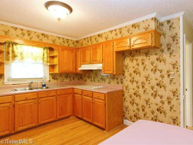 1623 Buckhorn Road Mebane, NC 27302 - Photo 6 of 16 Kitchen. 2nd View of Kitchen w/Ample Cabinets
