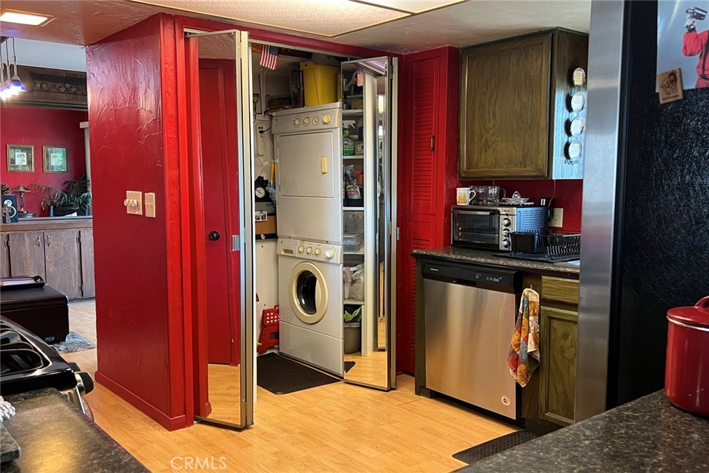 119 Del Mar Rancho Mirage, CA 92270 - Photo 19 of 40 a view of a kitchen with stainless steel appliances granite countertop a refrigerator and a sink