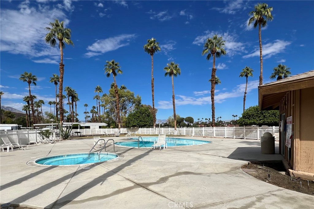 119 Del Mar Rancho Mirage, CA 92270 - Photo 38 of 40 a view of a terrace with a bench