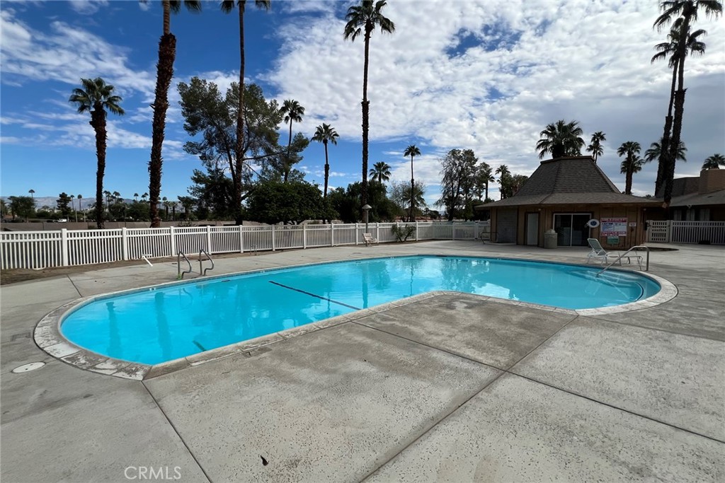 119 Del Mar Rancho Mirage, CA 92270 - Photo 39 of 40 an outdoor space with swimming pool and seating