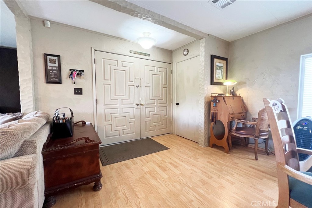 119 Del Mar Rancho Mirage, CA 92270 - Photo 10 of 40 a bedroom with a bed and a mirror