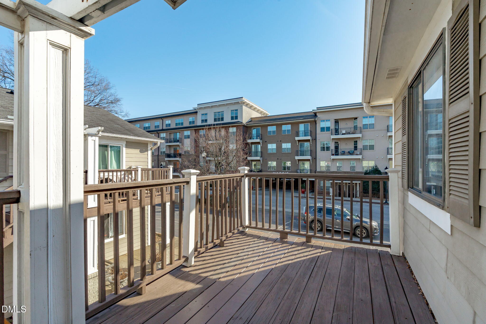 2208 Stafford Avenue Raleigh, NC 27607 - Photo 2 of 30 a view of a balcony with wooden floor
