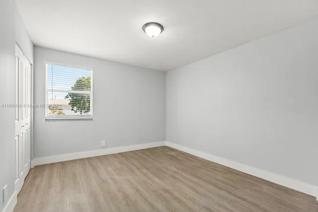 an empty room with a window