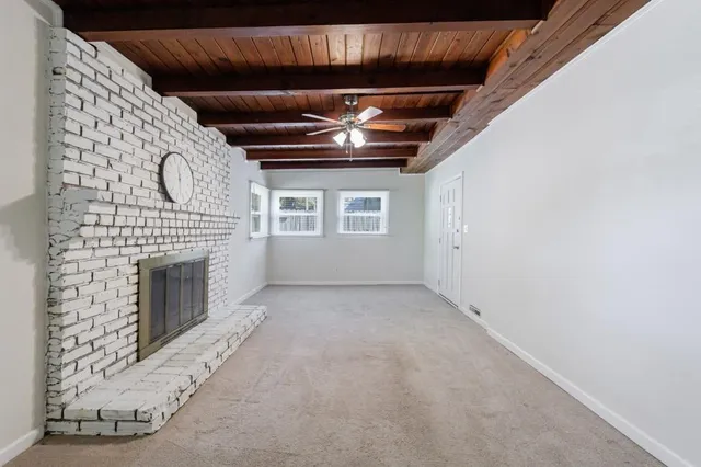 a view of entryway with a fireplace