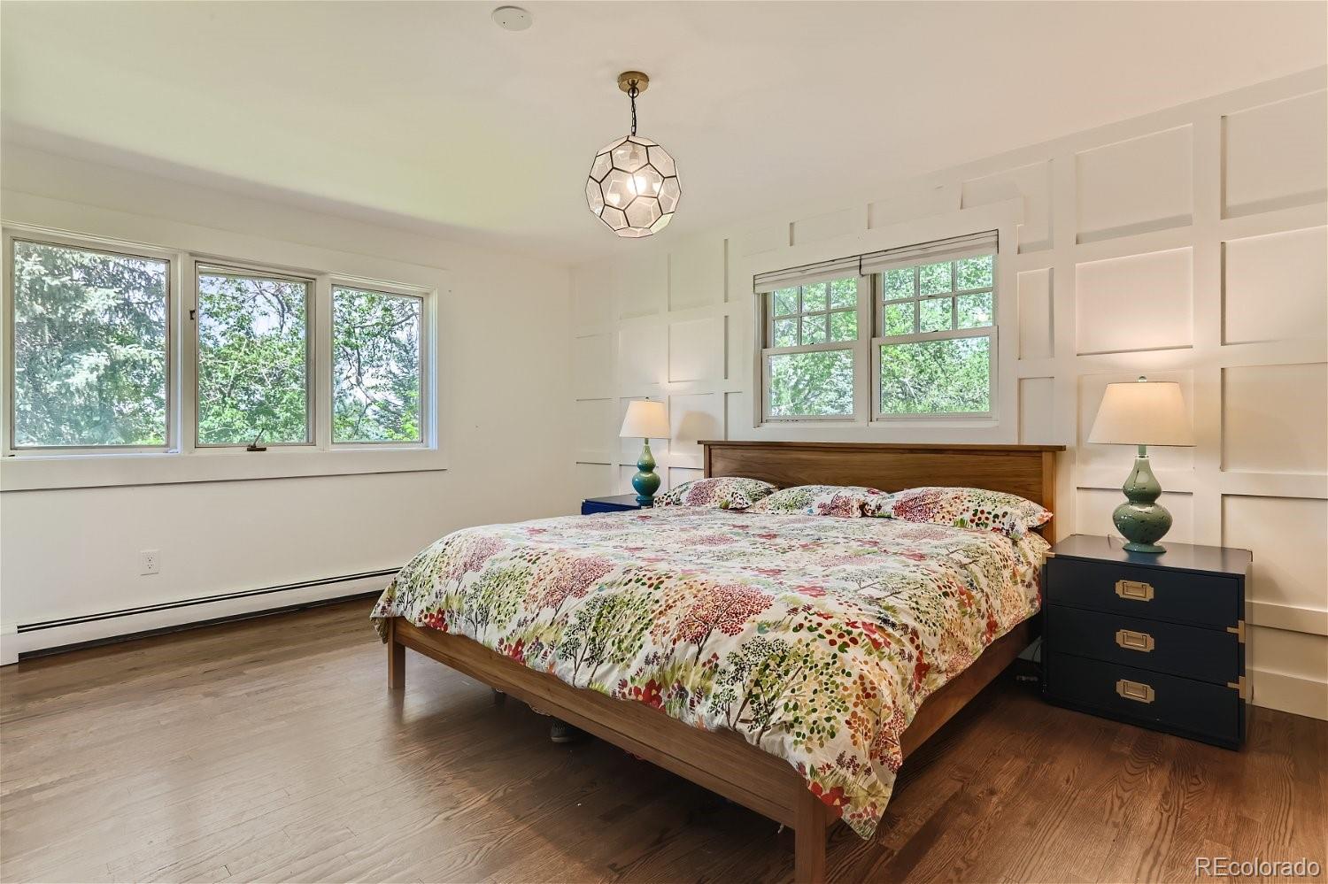 6650 Crestbrook Drive Morrison, CO 80465 - Photo 13 of 38 a bedroom with a bed and a window