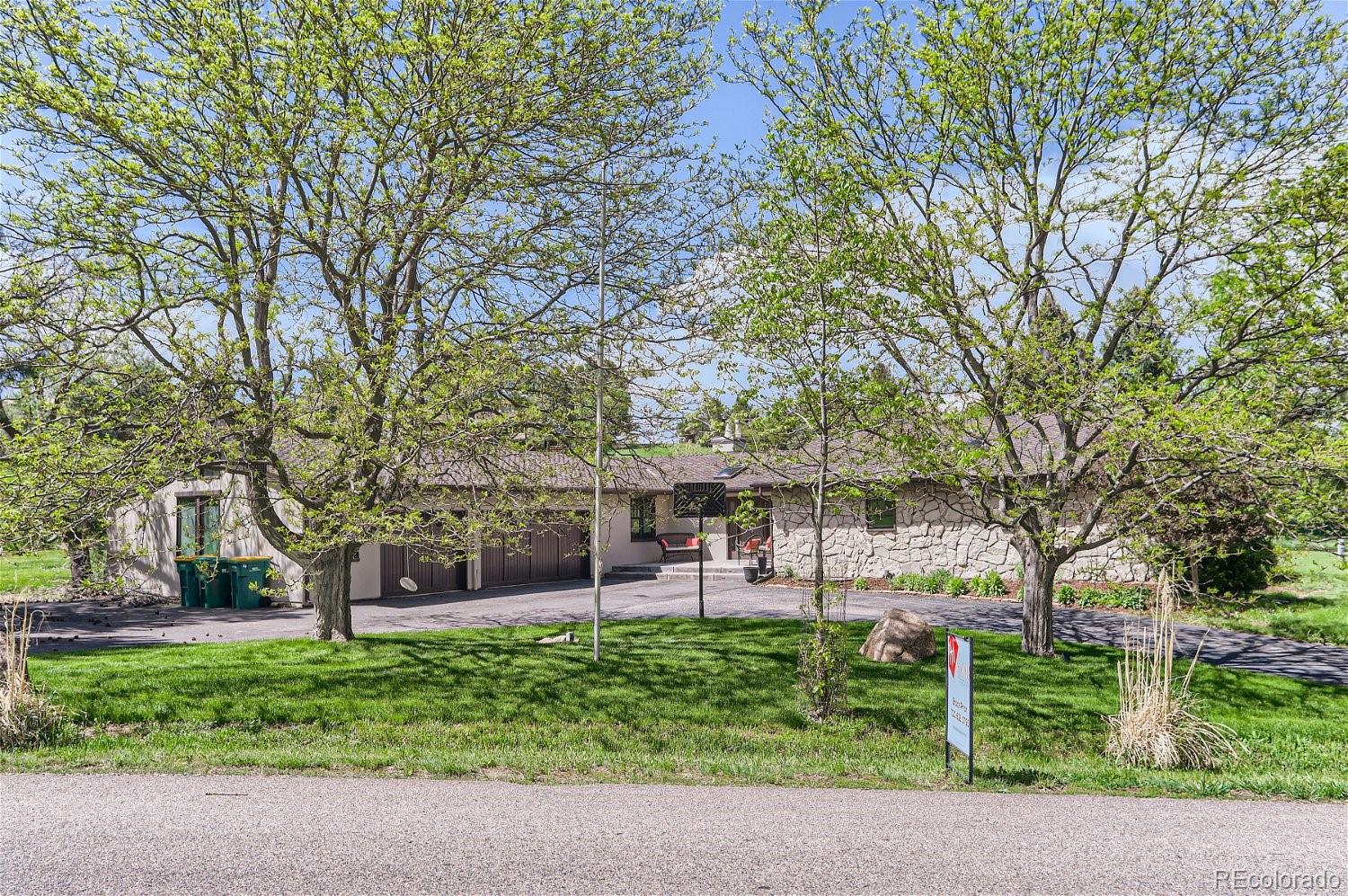 6650 Crestbrook Drive Morrison, CO 80465 - Photo 2 of 38 a view of a park with plants and trees